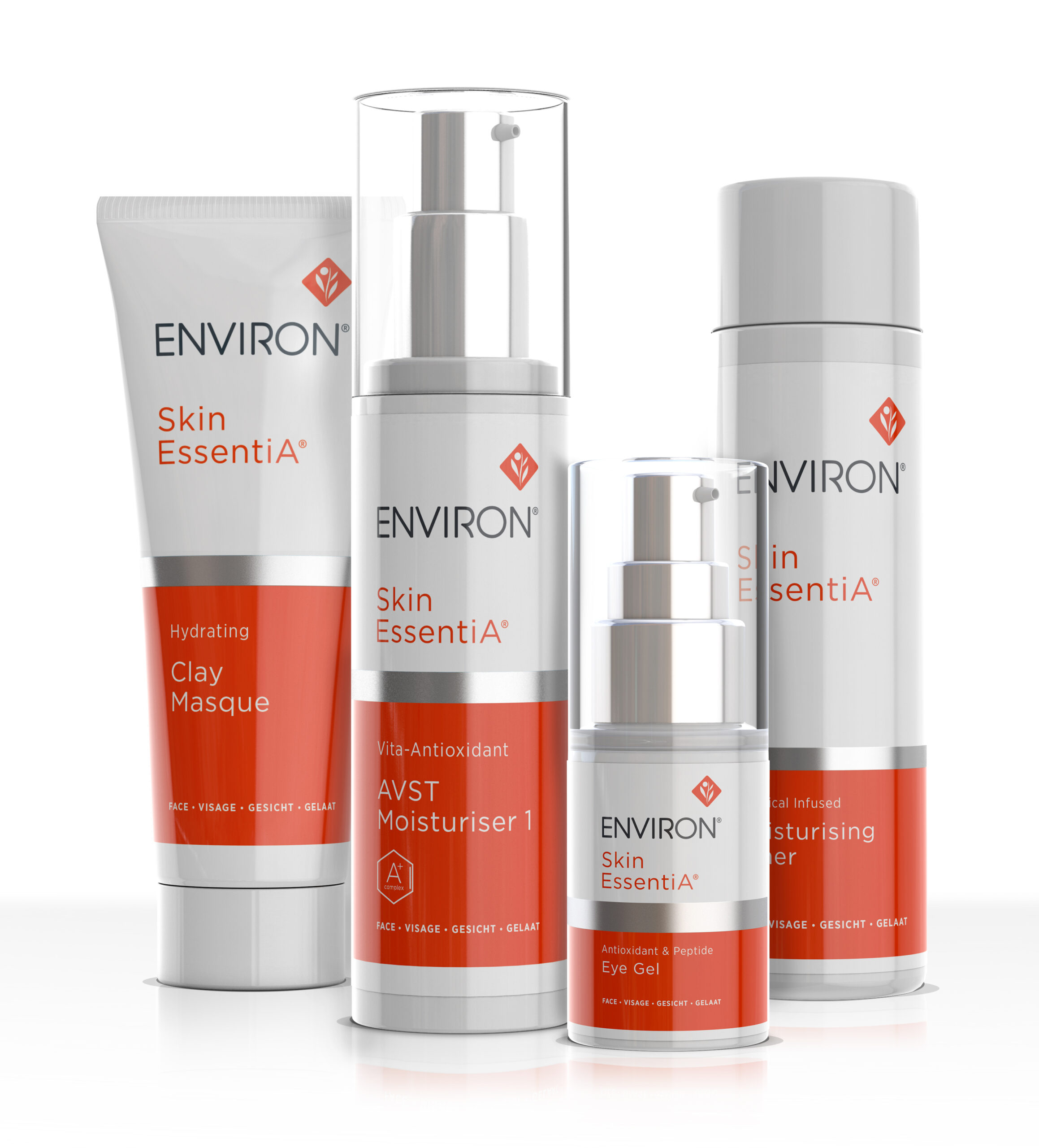 Vier Environ Skin EssentiA Pflegeprodukte stehen aufrecht: Hydrating Clay Masque, AVST Moisturiser 1, Eye Gel und Moisturising Toner - ideal für Hautprobleme, erhältlich im Kosmetik ATELIER Kosmetikstudio Hamburg in stylischen weiß-orangen Verpackungen. - KOSMETIK ATELIER Hamburg Winterhude